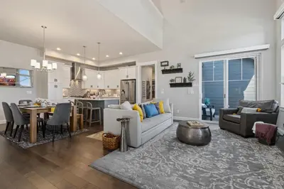 a living room with a couch and a table at Colorado Modern Retreat with King Beds, Pickleball in Loveland