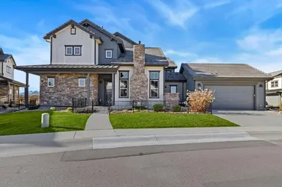 a large house with a driveway at Colorado Modern Retreat with King Beds, Pickleball in Loveland