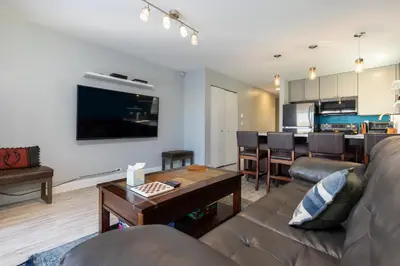 a living room with a couch and a table at Meadow Cove B1 condo in Dillon