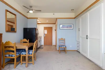 a dining room with a table and chairs at 2756 Slopeside condo in Keystone