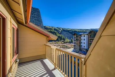 a balcony with a view of a city at 2301 Red Hawk Lodge condo in Snake River Health Services Incorporated Heliport