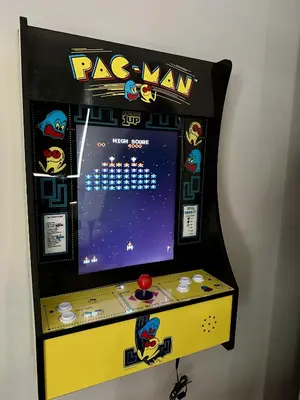 a pinball machine with a pokemon game on it at Keystone Adventures Basecamp townhouse in Keystone