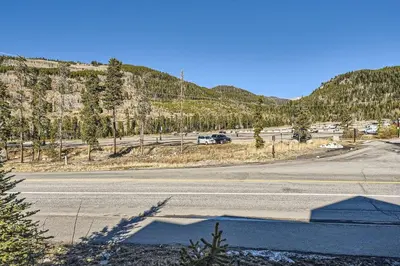 an empty road with a mountain in the background at 58 River Run Townhomes townhouse in Keystone