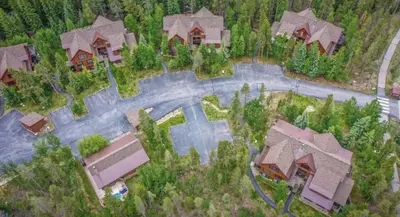 an overhead view of a house with a road at 8766 Trappers Crossing townhouse in Keystone
