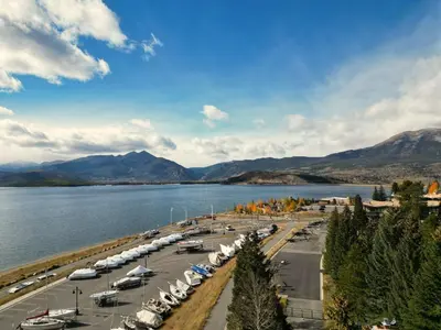a parking lot next to a large body of water at A106 Lake Cliffe condo in Dillon