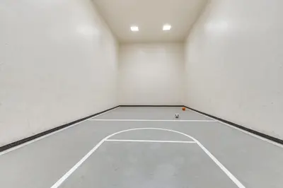 an empty room with a basketball court in it at 2 Mi to Winter Park Resort Condo with Pool Access! in Winter Park
