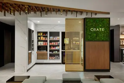 a store front with a gate sign on the wall at Courtyard by Marriott Denver Downtown West in Denver