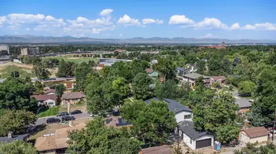 an aerial view of a town with houses and trees at Backyard Wonderland Ultimate Outdoor Fun in Denver