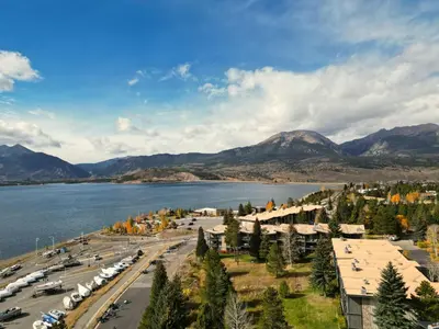 an aerial view of a town next to a body of water at A105 Lake Cliffe condo in Dillon