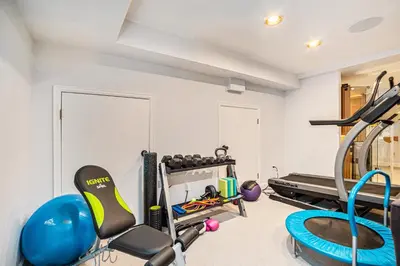 a gym with exercise equipment in a room at Townhouse near Cherry Creek w gym in Denver
