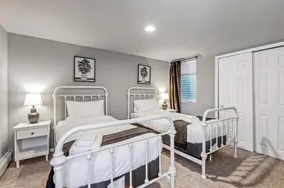 a bedroom with two beds and a window at Modern Family Haven Fenced Yrd GrillFirepit in Westminster