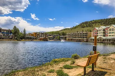 a bench sitting next to a body of water at 1776 Decatur condo in Dillon