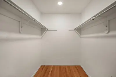 a room with white walls and white shelves at Suburban Sanctuary Sauna Tub Large Yard in Westminster