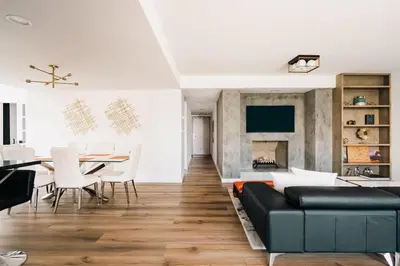 a living room with a couch and a table at Deluxe Larimer Square Retreat - Walk Everywhere! in Denver