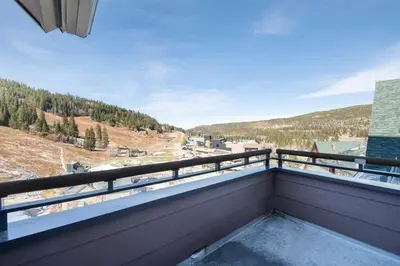 a balcony with a view of a mountain at Premium Unit 2801 - Zephyr Mountain Lodge condo in Winter Park
