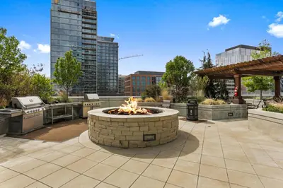 a fire pit in the middle of a patio at 1700 Bassett, Unit 711 in Denver