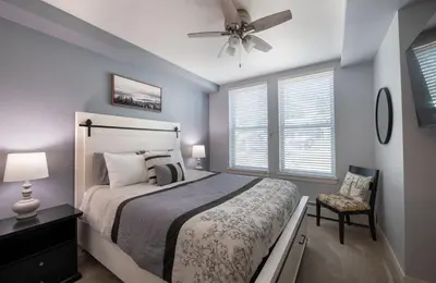 a bedroom with a bed and a ceiling fan at Premium Unit 4285 Fraser Crossing Founders Pointe condo in Winter Park
