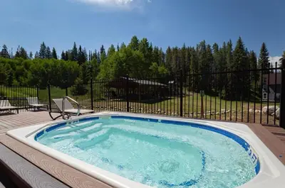 a jacuzziificialificialificialificialificialificialificialificialificialificialificial at Riverfront Retreat Just 7 Minutes from the Resort, with a Hot Tub and Pool walk to downtown in Winter Park