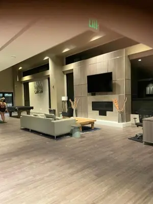 a large living room with couches and a flat screen tv at Riverfront Retreat Just 7 Minutes from the Resort, with a Hot Tub and Pool walk to downtown in Winter Park