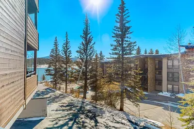 a view from the balcony of a building with trees at Marina Place 413 in Dillon
