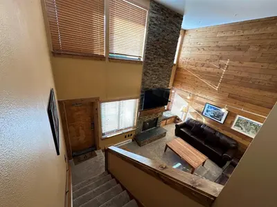 an overhead view of a living room with a couch at Lakeside, spacious, modern 2BR - sleeps up to 8 condo in Keystone