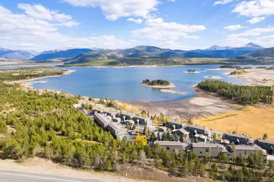 an aerial view of a resort on a lake at Lake Forest Mountainview Condo: Great Location, Amazing Views in Frisco