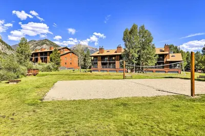 an empty park with a volleyball court in front of buildings at Mountainside Royalview Condo: Pool/Hot Tubs, Great Location in Frisco