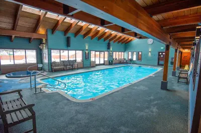 a large swimming pool in a building with a large pool at Mountainside Royalview Condo: Pool/Hot Tubs, Great Location in Frisco