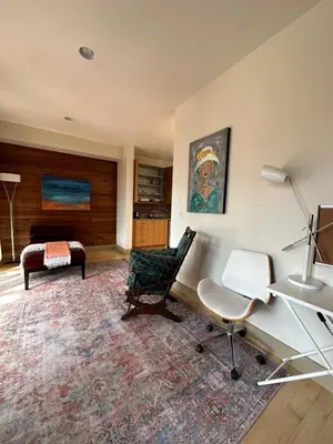 a room with a desk and a chair and a bed at Luxe 4 bed 5 bath with Parking Walk to Capitol, Convention Center, museums and shops in Denver