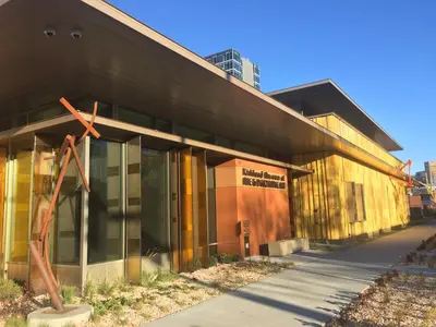 a building with a cross on the side of it at Luxe 4 bed 5 bath with Parking Walk to Capitol, Convention Center, museums and shops in Denver