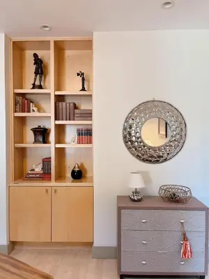 a room with a book shelf and a mirror at Luxe 4 bed 5 bath with Parking Walk to Capitol, Convention Center, museums and shops in Denver