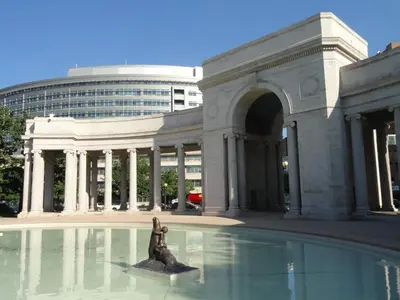 a statue in the water in front of a building at 1 bed apartment with parking - Denver Museum District Walk to Convention Center, Capital, museums and shops in Denver