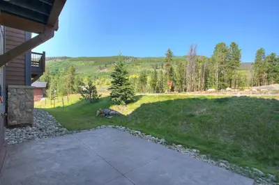 a driveway leading to a yard with a view at Luxury Home - Sleeps 10 - Fireplace & Mountain View condo in Keystone