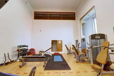 a gym with treadmills and exercise equipment in a room at 727B Meadow Creek townhouse in Frisco