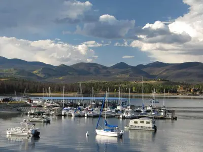 a bunch of boats are docked in a harbor at Aspen Meadows C-302, 0013 in Granby