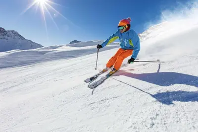 a person is skiing down a snow covered slope at Aspen Meadows C-302, 0013 in Granby