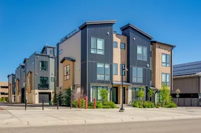 a row of apartment buildings on a city street at Hot Tub and Views Getaway 8 Mi to Keystone Resort! in Silverthorne