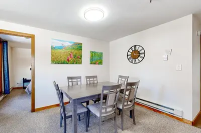 a dining room with a table and chairs at Mountain View Lakeside Retreat in Dillon
