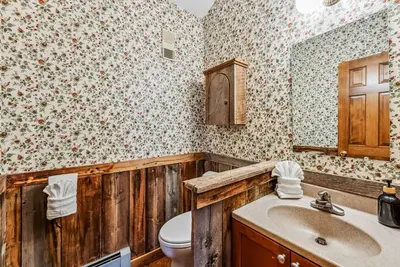 a bathroom with a sink and a toilet in it at Dillon Retreat with Lake Views and Private Hot Tub in Dillon