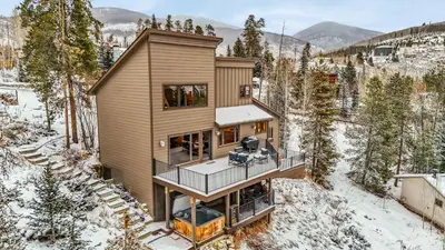 an aerial view of a house in the snow at Dillon Retreat with Lake Views and Private Hot Tub in Dillon