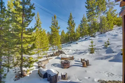a picnic area in the snow on a mountain at Close to RMNP and Beach Grand Lake Cabin Retreat! in Grand Lake