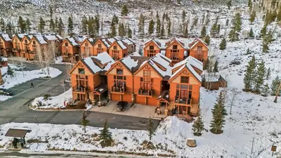 an aerial view of a large house in the snow at Cozy 3BR Keystone Escape with Fireplace and Hot Tub in Keystone