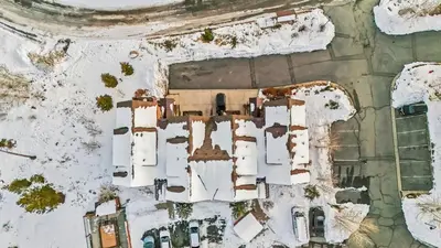 an aerial view of a building in the snow at Cozy 3BR Keystone Escape with Fireplace and Hot Tub in Keystone