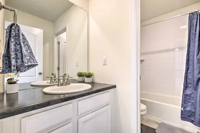 a bathroom with a sink and a toilet at Charming 3BR Retreat - Perfect for Families! in Fort Collins