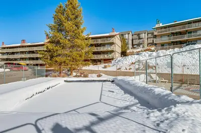 a skate park covered in snow with a skateboard ramp at 5 Mi to Winter Park Resort Unit with Pool and Hot Tub in Fraser