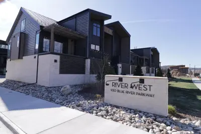 a house with a keep west sign in front of it at River West 611 condo in Silverthorne