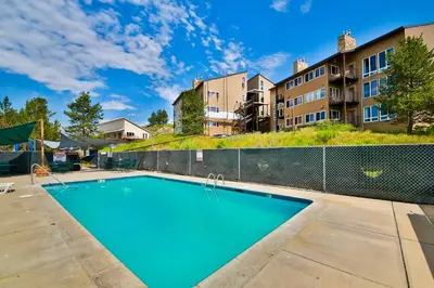 an image of a swimming pool at a apartment complex at Mountainside 037 in Granby