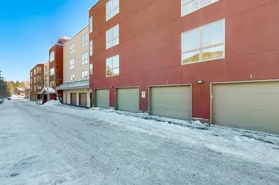 a row of garages on the side of a building at Lakefront Keystone Studio in Keystone