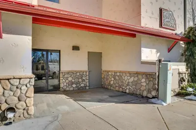 a front door of a building with a garage at 6 Mi to Keystone Resort Dillon Condo with Balcony in Dillon