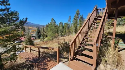 a wooden staircase leading up to a house at Palmers Dr 1010 in Silverthorne